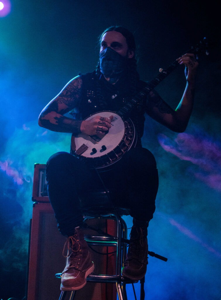 A man playing the banjo