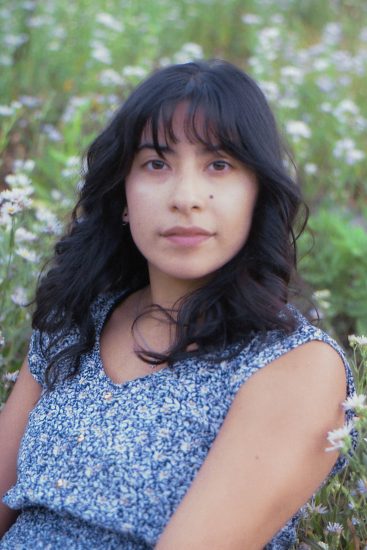 Film photo of a woman in wildflowers